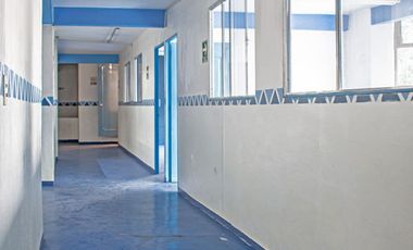 Edificio multi funcional en zona comercial