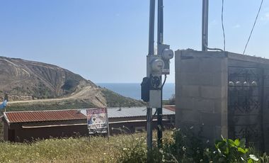 Terreno con casa móvil en Rosarito