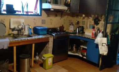 Terreno con casa a demoler y depto interno