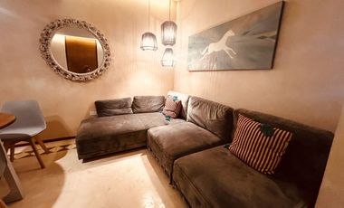 Departamento en venta 1 recamara en planta baja con jardín en Aldea Zama