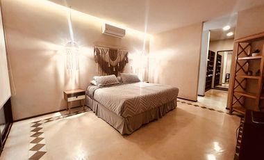 Departamento en venta 1 recamara en planta baja con jardín en Aldea Zama