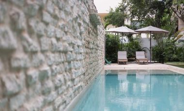 Departamento en venta 1 recamara en planta baja con jardín en Aldea Zama