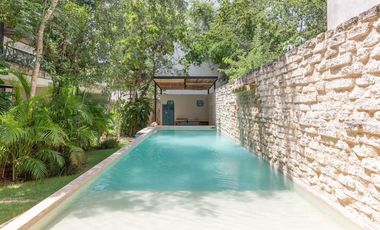 Departamento en venta 1 recamara en planta baja con jardín en Aldea Zama