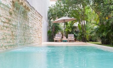 Departamento en venta 1 recamara en planta baja con jardín en Aldea Zama