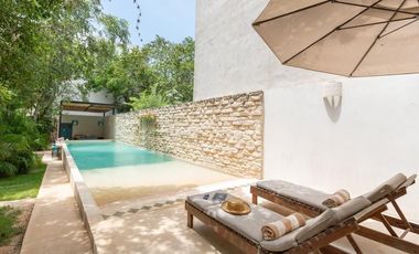 Departamento en venta 1 recamara en planta baja con jardín en Aldea Zama