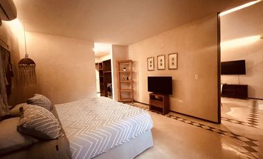 Departamento en venta 1 recamara en planta baja con jardín en Aldea Zama