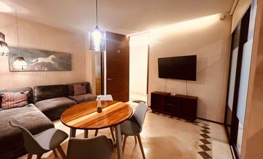 Departamento en venta 1 recamara en planta baja con jardín en Aldea Zama