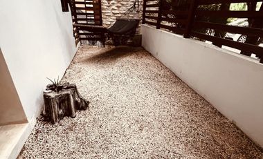 Departamento en venta 1 recamara en planta baja con jardín en Aldea Zama