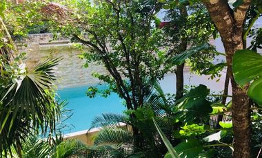 Departamento en venta 1 recamara en planta baja con jardín en Aldea Zama