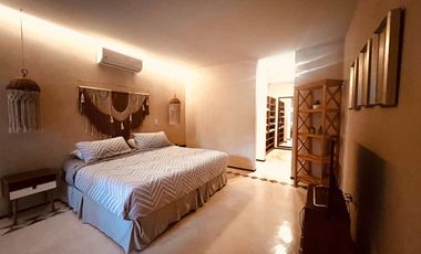 Departamento en venta 1 recamara en planta baja con jardín en Aldea Zama