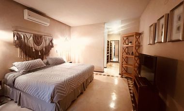 Departamento en venta 1 recamara en planta baja con jardín en Aldea Zama