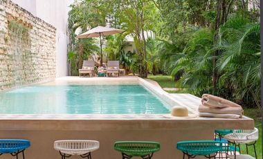 Departamento en venta 1 recamara en planta baja con jardín en Aldea Zama