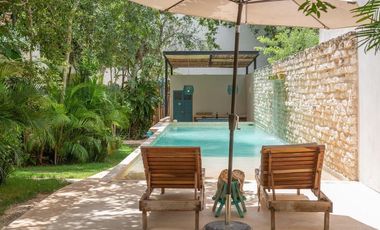 Departamento en venta 1 recamara en planta baja con jardín en Aldea Zama