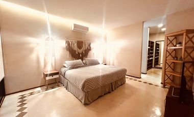 Departamento en venta 1 recamara en planta baja con jardín en Aldea Zama