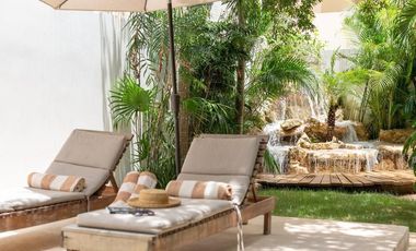 Departamento en venta 1 recamara en planta baja con jardín en Aldea Zama