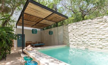 Departamento en venta 1 recamara en planta baja con jardín en Aldea Zama