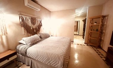 Departamento en venta 1 recamara en planta baja con jardín en Aldea Zama