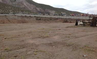 Renta terreno de 20.835m2 con cerramiento y oficina en la Mitad del Mundo