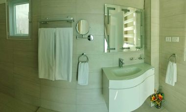 Finest Residential Service Property nestled in a tropical park with ocean view