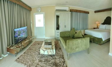 Finest Residential Service Property nestled in a tropical park with ocean view