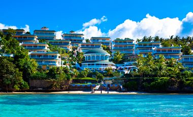 Finest Residential Service Property nestled in a tropical park with ocean view