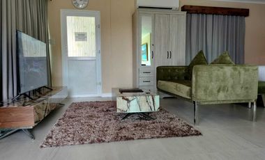 Finest Residential Service Property nestled in a tropical park with ocean view