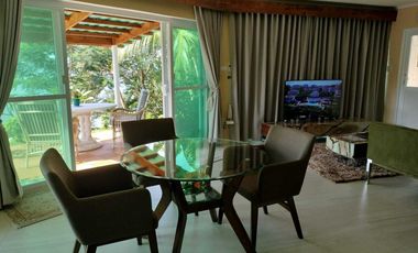 Finest Residential Service Property nestled in a tropical park with ocean view