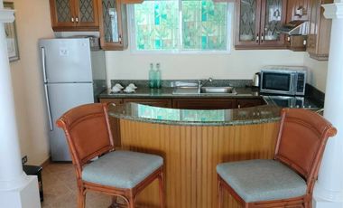 Finest Residential Service Property nestled in a tropical park with ocean view