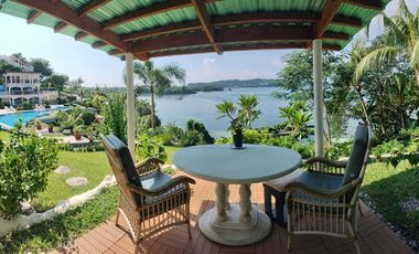 Finest Residential Service Property nestled in a tropical park with ocean view