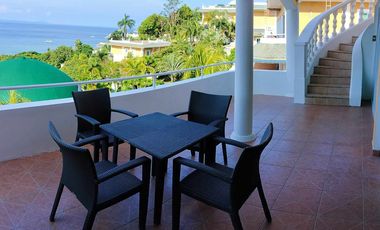 Finest Residential Service Property nestled in a tropical park with ocean view