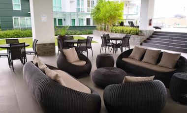 Modern Furnished One Bedroom Corner Condo unit with parking