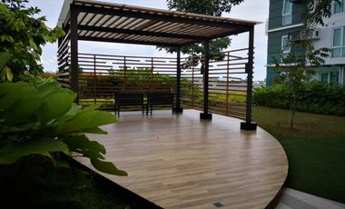 Modern Furnished One Bedroom Corner Condo unit with parking
