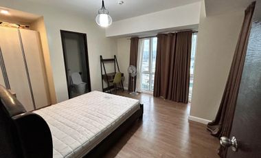 Modern Furnished One Bedroom Corner Condo unit with parking