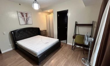 Modern Furnished One Bedroom Corner Condo unit with parking