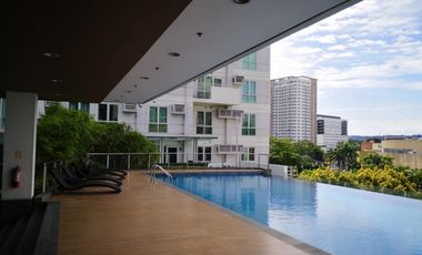 Modern Furnished One Bedroom Corner Condo unit with parking