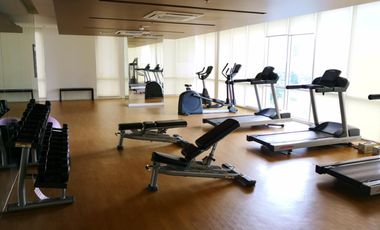 Modern Furnished One Bedroom Corner Condo unit with parking