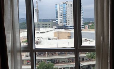 Modern Furnished One Bedroom Corner Condo unit with parking