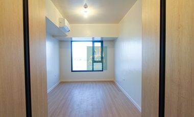 Seaview 2-Bedroom Unit with Balcony at Mandani Bay Tower 1 – Priced to Sell!