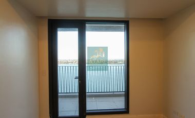 Seaview 2-Bedroom Unit with Balcony at Mandani Bay Tower 1 – Priced to Sell!