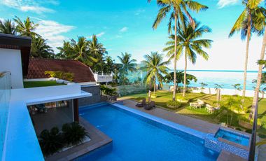 For Sale: Luxurious 4-Bedroom Beachfront Estate with Expansive Garden in Carmen