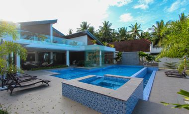 For Sale: Luxurious 4-Bedroom Beachfront Estate with Expansive Garden in Carmen
