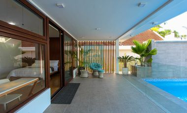 For Sale: Luxurious 4-Bedroom Beachfront Estate with Expansive Garden in Carmen
