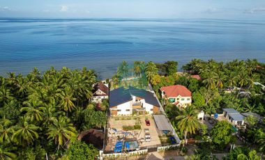 For Sale: Luxurious 4-Bedroom Beachfront Estate with Expansive Garden in Carmen