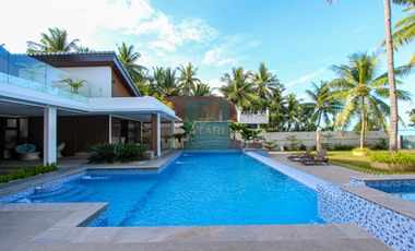 For Sale: Luxurious 4-Bedroom Beachfront Estate with Expansive Garden in Carmen