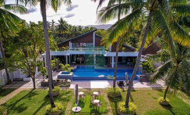 For Sale: Luxurious 4-Bedroom Beachfront Estate with Expansive Garden in Carmen