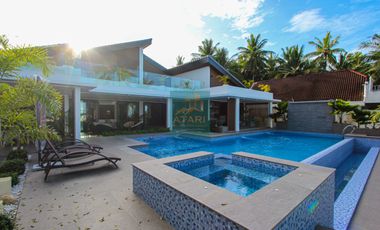 For Sale: Luxurious 4-Bedroom Beachfront Estate with Expansive Garden in Carmen