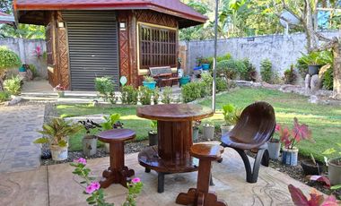 Big land area with house; landscaped grounds; close to beach; development ready