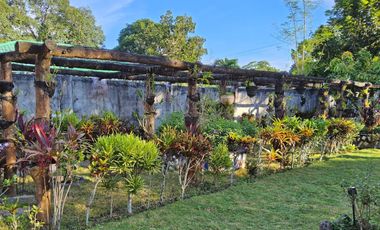 Big land area with house; landscaped grounds; close to beach; development ready