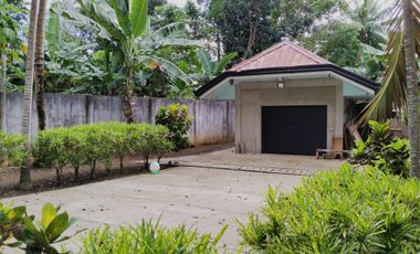 Big land area with house; landscaped grounds; close to beach; development ready