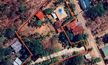 Big land area with house; landscaped grounds; close to beach; development ready